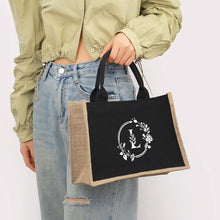 Bolso de mano de lona de lino con parches negros y estampado de letras de hoja plateada, con bolsa interior impermeable de gran capacidad para el día a día.