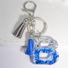 Llaveros creativos de resina de 26 letras con borla, accesorios de moda con iniciales, lentejuelas, color azul y plateado, colgante para bolso