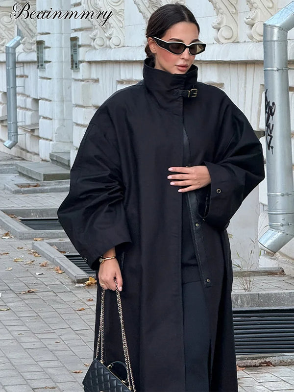 Gabardina larga negra de color sólido para mujer, cuello alto, corte holgado, hombros caídos, cortavientos de botonadura sencilla, ideal para el trabajo o salidas casuales.