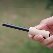 Portable outdoor flint, equipped with outdoor survival tools such as magnesium sticks, firearms, wooden handles, and flint stick