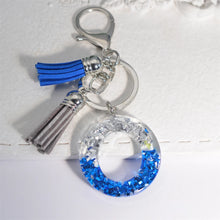 Llaveros creativos de resina de 26 letras con borla, accesorios de moda con iniciales, lentejuelas, color azul y plateado, colgante para bolso