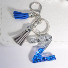 Llaveros creativos de resina de 26 letras con borla, accesorios de moda con iniciales, lentejuelas, color azul y plateado, colgante para bolso