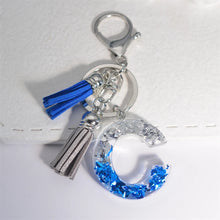 Llaveros creativos de resina de 26 letras con borla, accesorios de moda con iniciales, lentejuelas, color azul y plateado, colgante para bolso