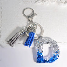 Llaveros creativos de resina de 26 letras con borla, accesorios de moda con iniciales, lentejuelas, color azul y plateado, colgante para bolso